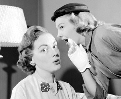 woman telling secret embracedesires